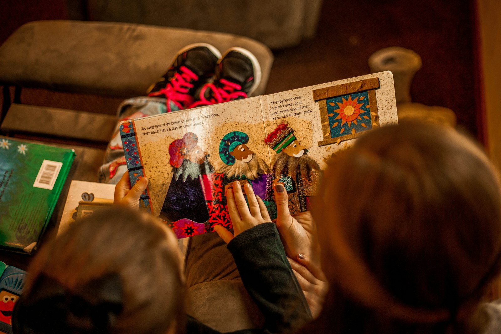 Children reading together to build school readiness skills